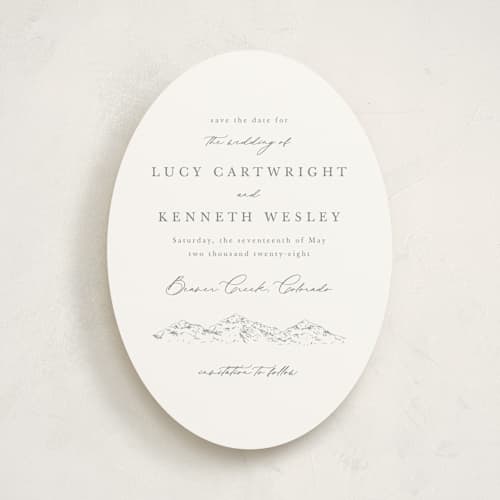 This is a pewter save the date with standard by Sarah Brown called mountainview printing on signature in standard