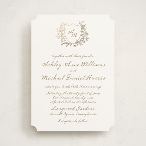 This is a ivory foil stamped wedding invitations with foil pressed by Cass Loh called boho flower crest printing on signature in standard