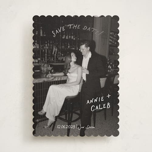 This is a ivory foil stamped save the date cards with foil pressed by Stephanie Heinrich Godbout called lovers printing on recycled smooth signature in standard