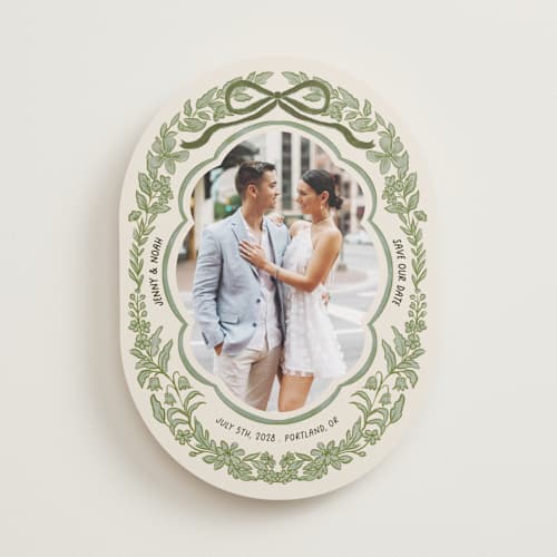 This is a olive save the date with standard by Elly called charm printing on recycled smooth signature in standard