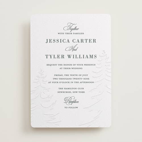 This is a slate letterpress wedding invitations with letterpress by Teju Reval called evergreen printing on white cotton in standard