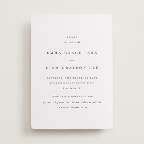 This is a soft black save the date with letterpress by Design Lotus called a thousand years printing on white cotton in standard