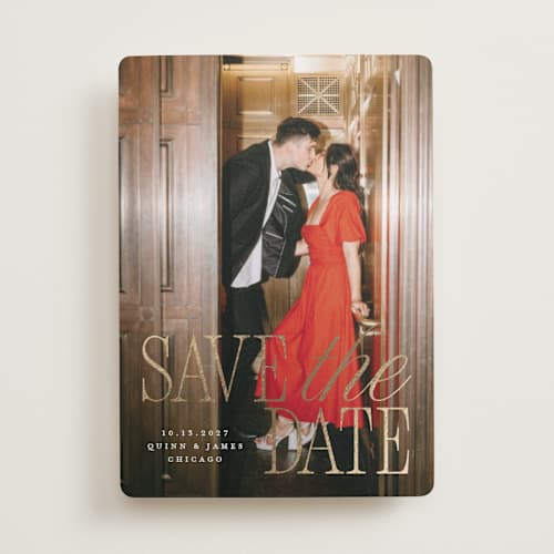 This is a snow foil stamped save the date cards with foil pressed by Pixel and Hank called love song printing on recycled smooth signature in standard