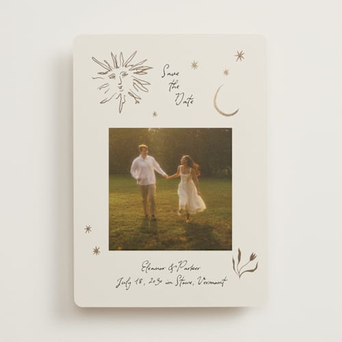 This is a champagne foil stamped save the date cards with foil pressed by Heather Schertzer called soleil printing on recycled smooth signature in standard