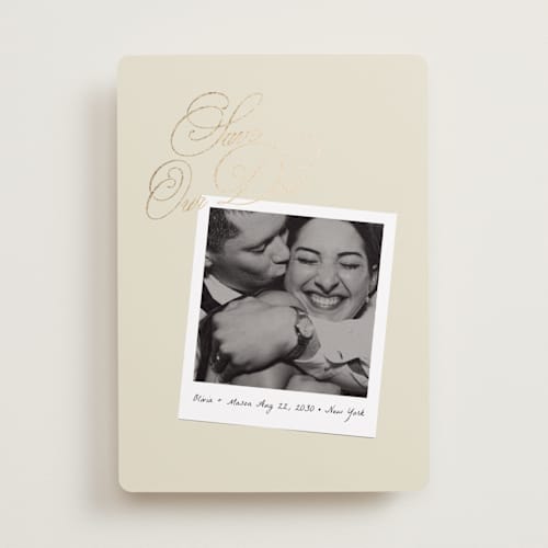 This is a linen foil stamped save the date cards with foil pressed by Lori Wemple called polaroid script printing on recycled smooth signature in standard