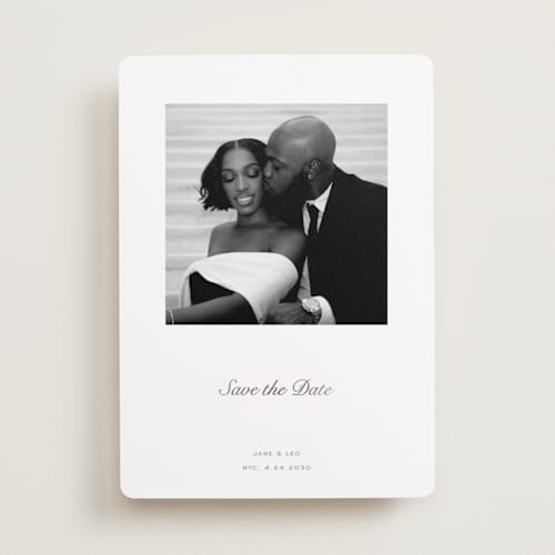 This is a snow foil stamped save the date cards with foil pressed by Megan Davis called curate printing on recycled smooth signature in standard