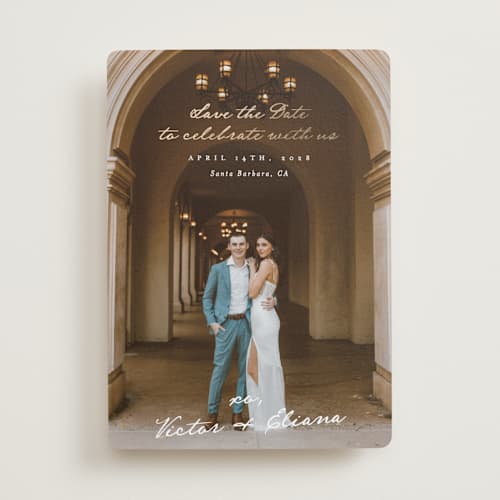 This is a ivory foil stamped save the date cards with foil pressed by Alethea and Ruth called celebration xo printing on recycled smooth signature in standard