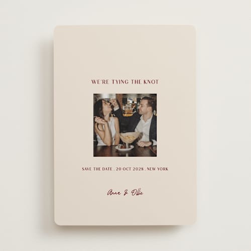 This is a burgundy save the date with standard by Ani Somi called center cut printing on recycled smooth signature in standard