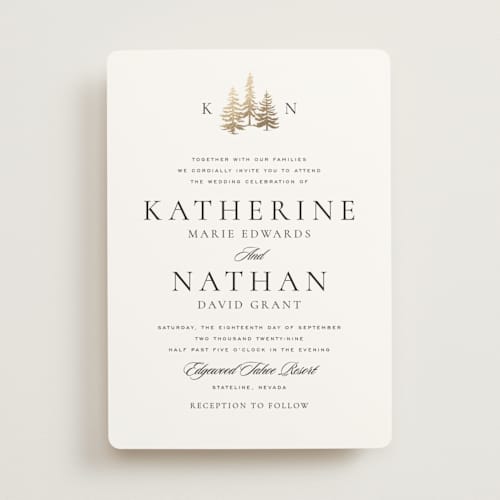 This is a snow foil stamped wedding invitations with foil pressed by Stacy Maalouf called gilded forest printing on signature in standard