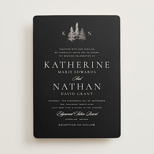 This is a eclipse foil stamped wedding invitations with foil pressed by Stacy Maalouf called gilded forest printing on signature in standard