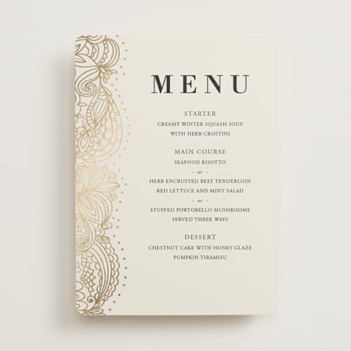 This is a champagne menu cards with foil pressed by Oma N. Ramkhelawan called elegant henna printing on signature in standard