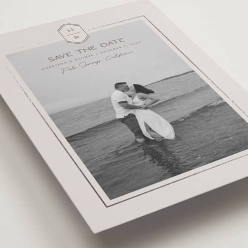 This is a dove foil stamped save the date cards with foil pressed by Rachelle Clarke called modern monogram printing on recycled smooth signature in grand