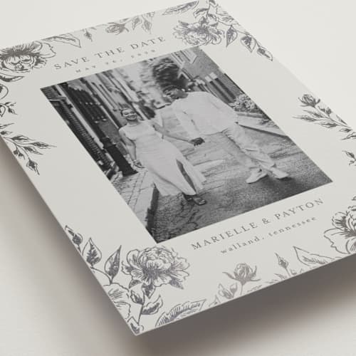 This is a steel foil stamped save the date cards with foil pressed by Chris Griffith called wildflower date printing on recycled smooth signature in grand