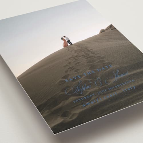 This is a blue mist save the date with standard by Design Lotus called amalfi blue printing on recycled smooth signature in grand