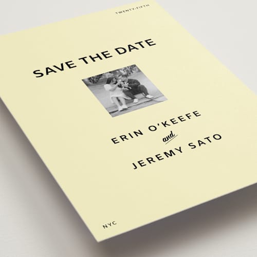 This is a butter save the date with standard by Studio Suku called courthouse printing on recycled smooth signature in grand
