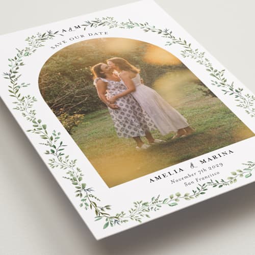 This is a mojito save the date with standard by Susan Moyal called monogramed arch printing on recycled smooth signature in grand