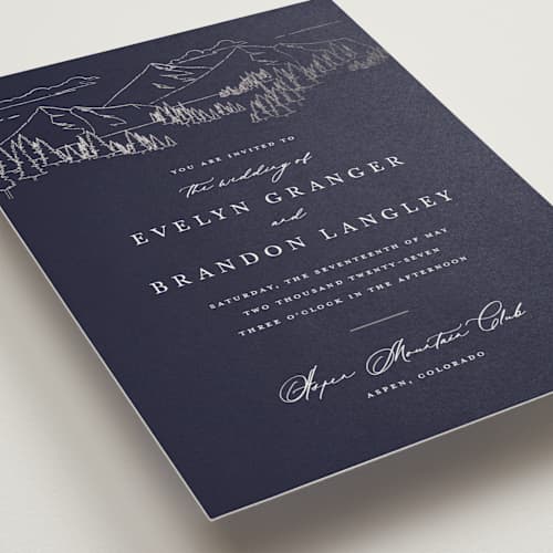 This is a navy wedding invitations with foil pressed by Sarah Brown called peaks printing on signature in grand