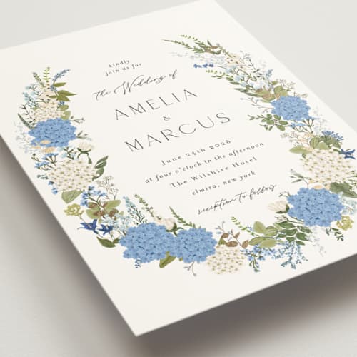This is a coastal wedding invitations with foil pressed by Susan Moyal called garden whisper printing on signature in grand