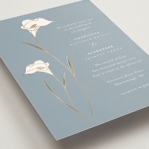 This is a dusty blue wedding invitations with foil pressed by Stacey Meacham called elegant lillies printing on signature in grand