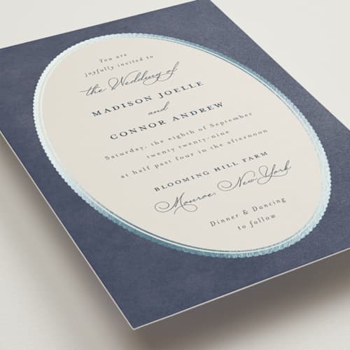 This is a navy wedding invitations with foil pressed by Emily Betts called vintage oval printing on signature in grand
