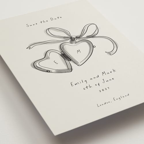 This is a ink wash save the date with standard by Ani Somi called heart shaped locket printing on signature in grand