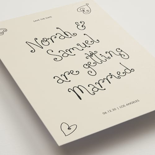 This is a ink save the date with standard by Kelly Watkins called hand-drawn hearts printing on signature in grand