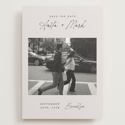 This is a eggshell save the date with standard by Paper Raven Co. called moment in time printing on recycled smooth signature in grand