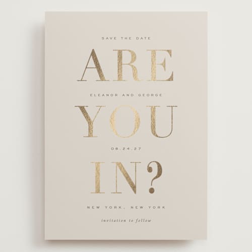 This is a taupe foil stamped save the date cards with foil pressed by Sara Hicks Malone called are you in? printing on signature in grand