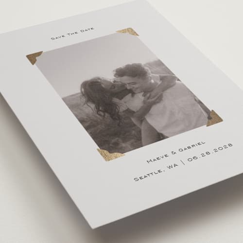 This is a cream petite save the dates with foil pressed by Jenny Millington called scrapbook frame printing on recycled smooth signature in petite