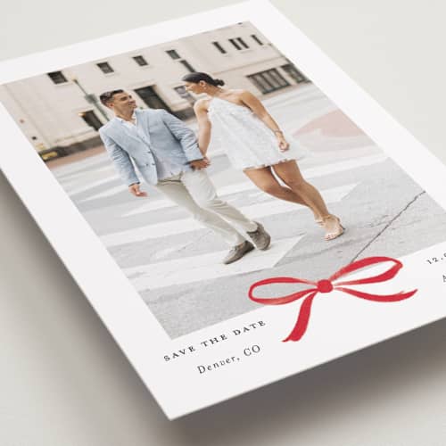 This is a crimson petite save the dates with standard by Olivia Kanaley Inman called crimson bow printing on recycled smooth signature in petite