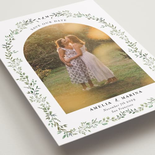 This is a mojito petite save the dates with standard by Susan Moyal called monogramed arch printing on recycled smooth signature in petite