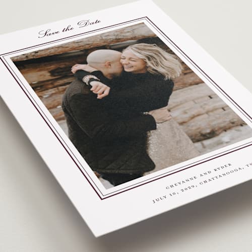 This is a burgundy petite save the dates with standard by Stacey Meacham called engraved names printing on recycled smooth signature in petite