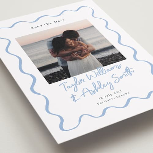 This is a dusty blue petite save the dates with standard by Cass Loh called handdrawn wavy frame printing on recycled smooth signature in petite