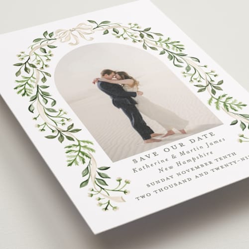 This is a sage petite save the dates with standard by Sarah Knight called greenery crest printing on recycled smooth signature in petite