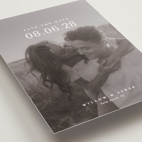 This is a moonstone petite save the dates with standard by Lucrecia Caporale called classic big date printing on recycled smooth signature in petite