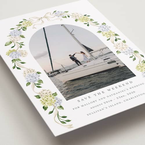 This is a coastline petite save the dates with standard by Sarah Knight called coastal hydrangea printing on recycled smooth signature in petite