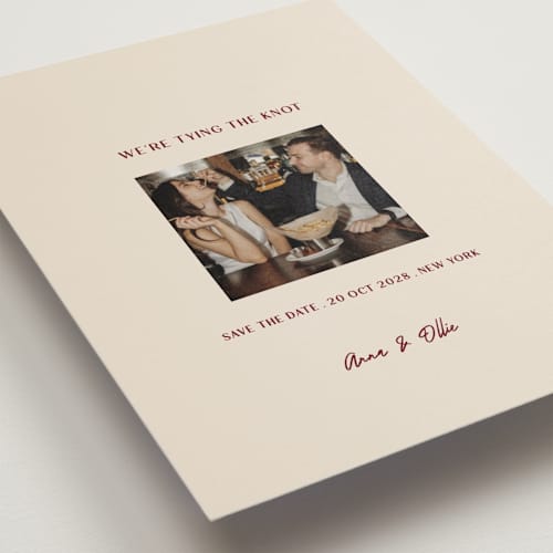 This is a burgundy save the date postcards with standard by Ani Somi called center cut printing on signature in postcard
