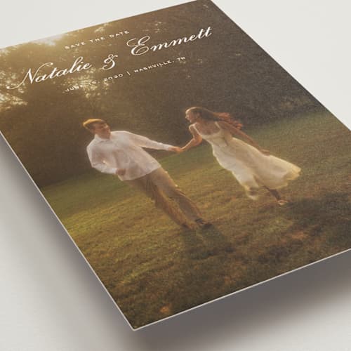 This is a ivory save the date postcards with standard by Emily Betts called story printing on signature in postcard