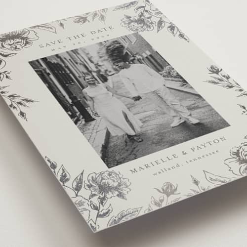 This is a steel save the date postcards with foil pressed by Chris Griffith called wildflower date printing on signature in postcard