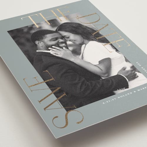 This is a pebble save the date postcards with foil pressed by Susan Zinader called picturesque printing on signature in postcard