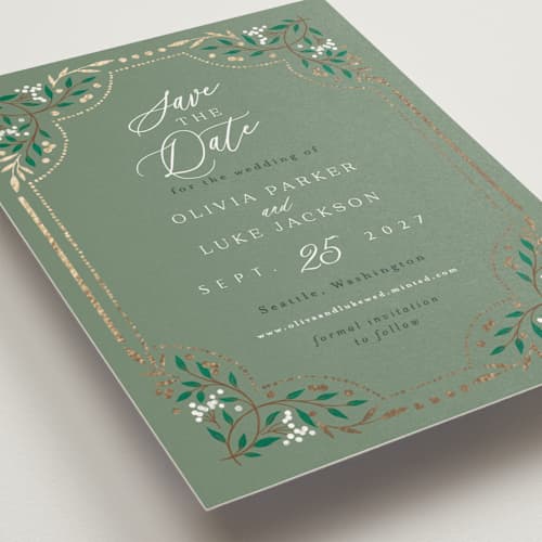 This is a evergreen save the date postcards with foil pressed by Alethea and Ruth called illuminated storybook printing on signature in postcard