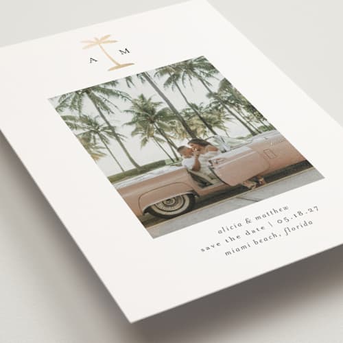 This is a coconut save the date postcards with foil pressed by Heather Schertzer called palm tree printing on signature in postcard