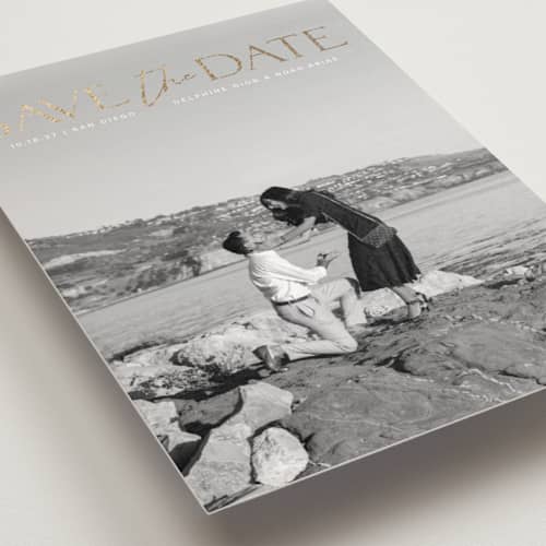 This is a moonstone save the date postcards with foil pressed by Olivia Raufman called breathtaking printing on signature in postcard