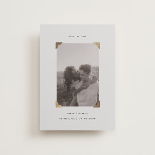 This is a cream petite save the dates with foil pressed by Jenny Millington called scrapbook frame printing on recycled smooth signature in petite