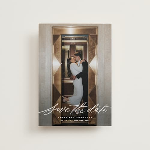 This is a chamomile petite save the dates with standard by Wildfield Paper Co called daisy printing on recycled smooth signature in petite