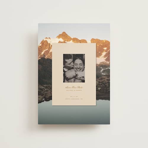 This is a sand petite save the dates with standard by Claudia Orengo called location printing on recycled smooth signature in petite