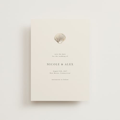 This is a sand petite save the dates with foil pressed by Hannah Bowman called simple seashell printing on signature in petite