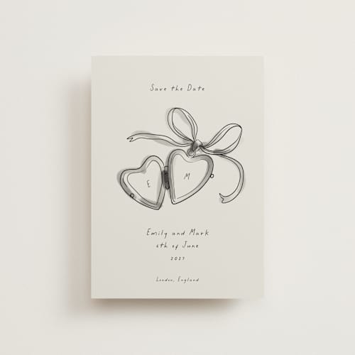 This is a ink wash save the date postcards with standard by Ani Somi called heart shaped locket printing on signature in postcard