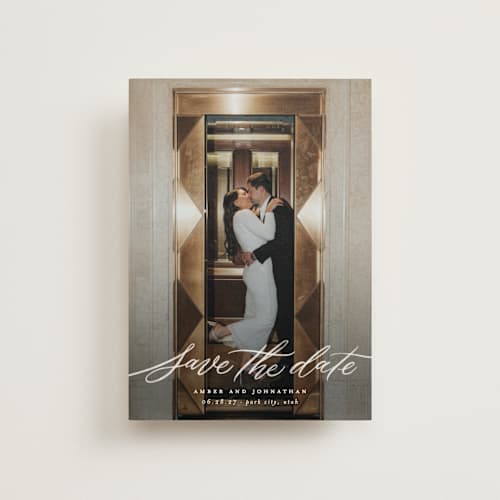 This is a chamomile save the date postcards with standard by Wildfield Paper Co called daisy printing on signature in postcard