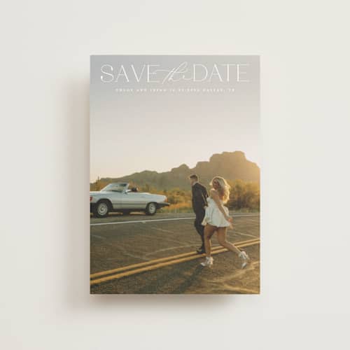 This is a ivory save the date postcards with standard by Maja Cunningham called prose printing on signature in postcard